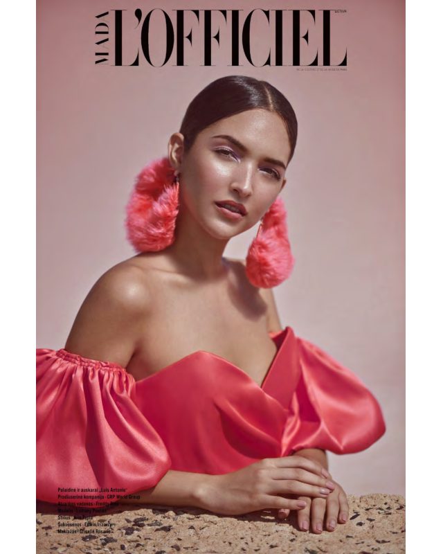 L’Officiel Lithuania beauty editorial with a model in a pink off-the-shoulder dress